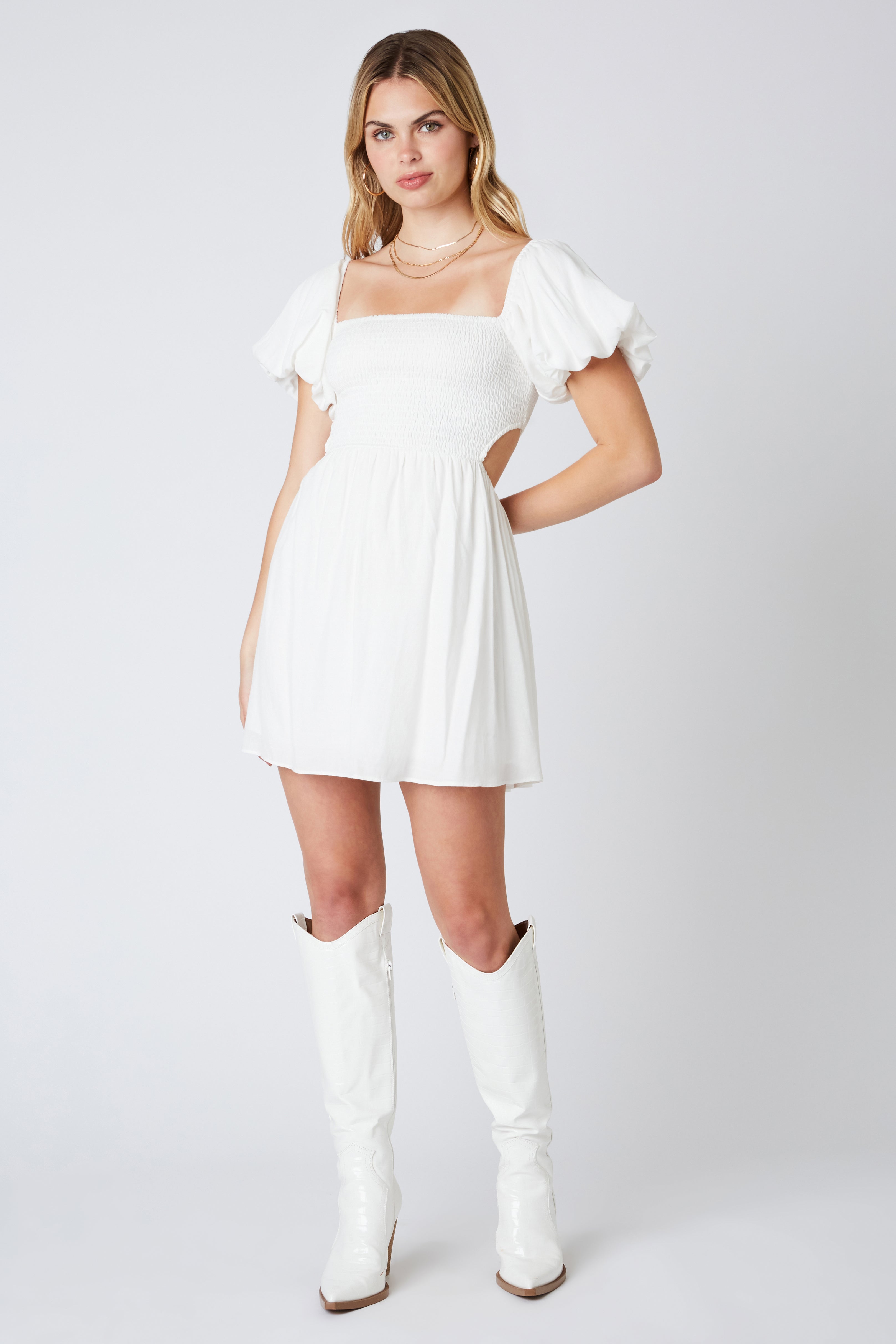 Smocked Babydoll Dress in White Front
