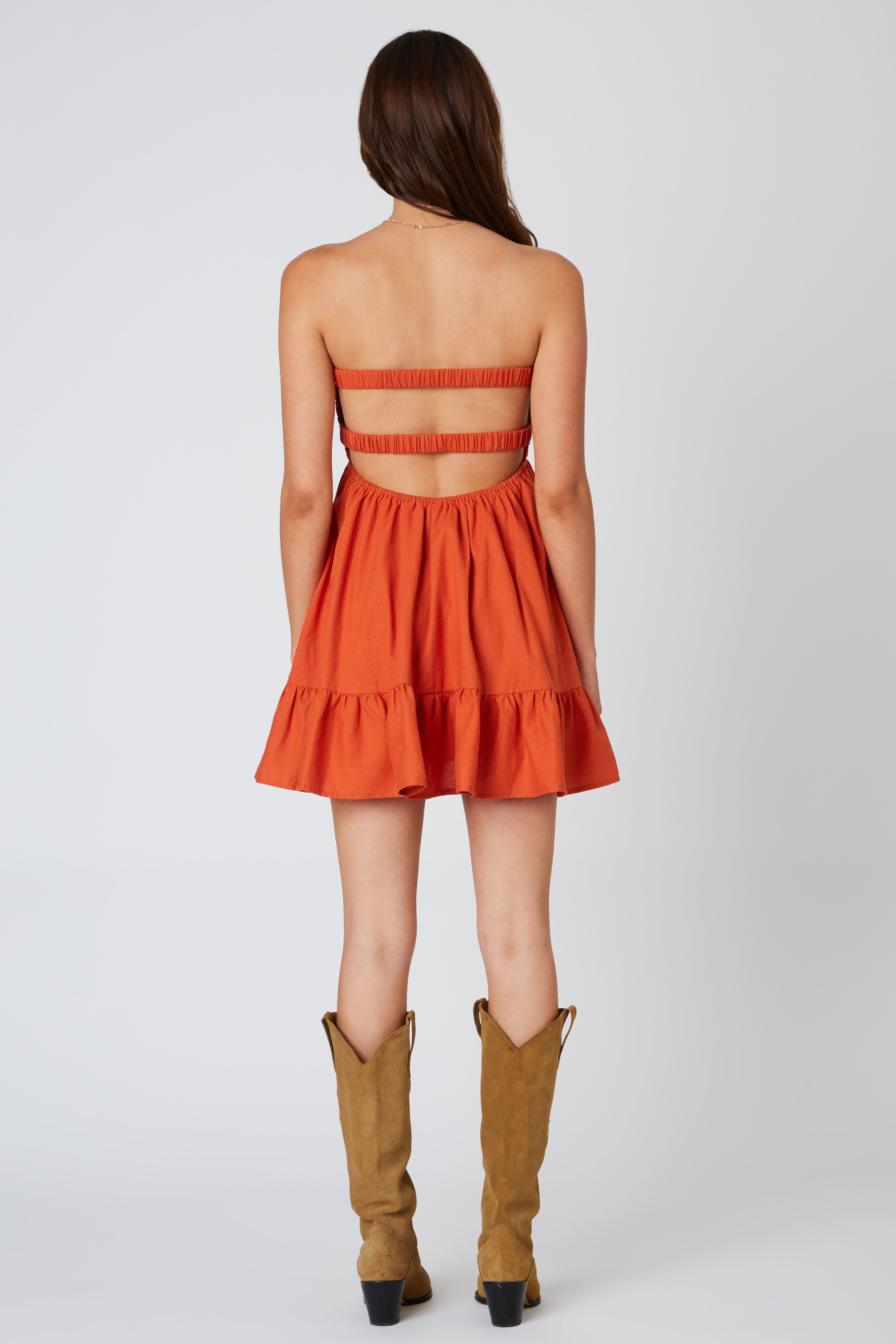 Twisted Keyhole Romper in Burnt Orange back view 1