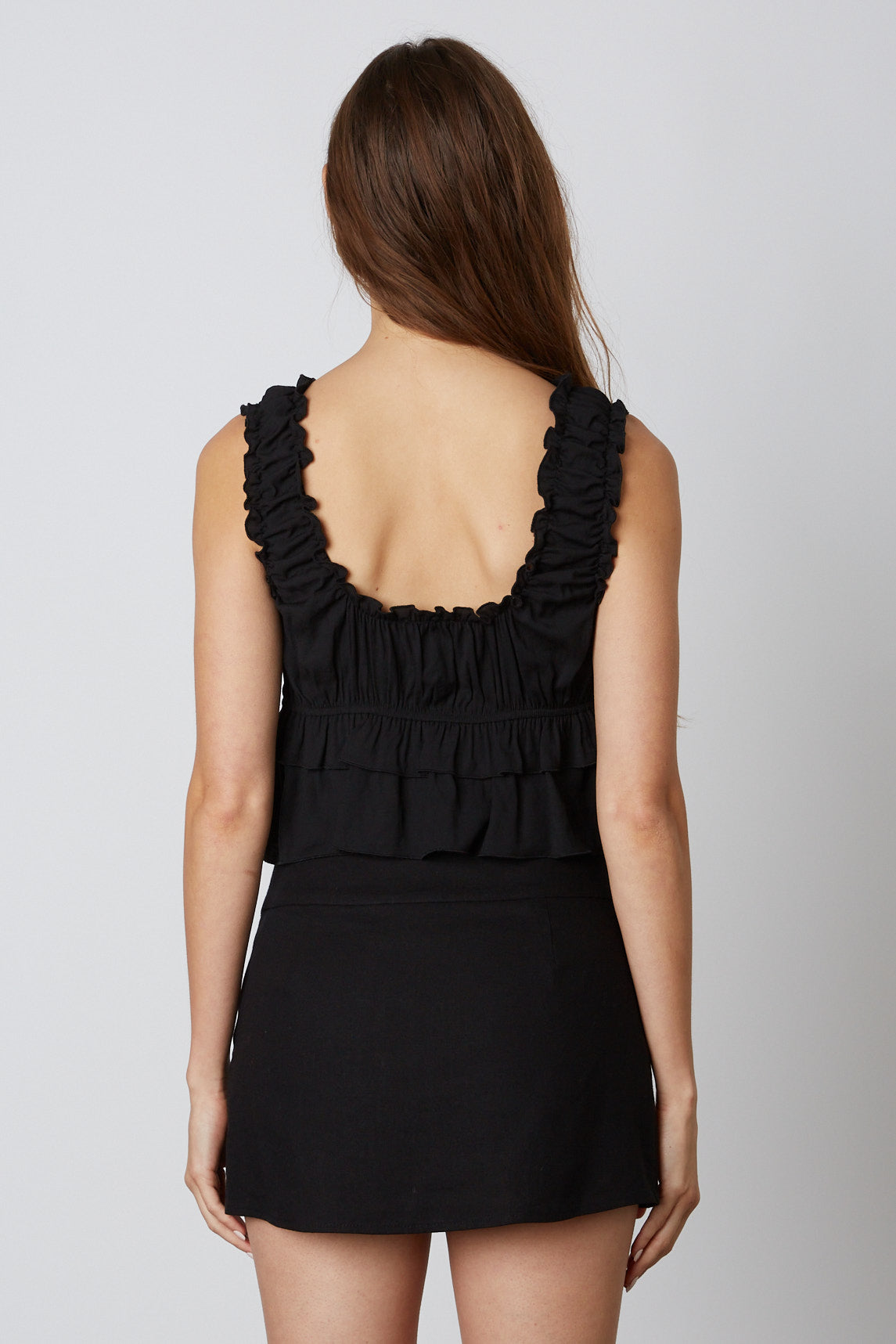 Ruffled Peplum Top in Black Back View