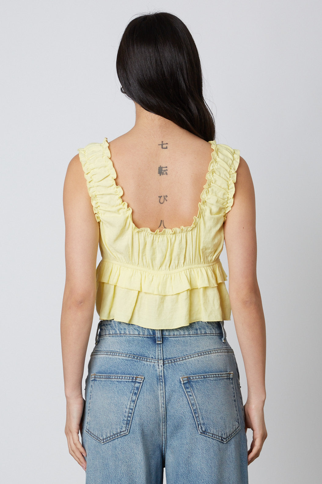 Ruffled Peplum Top in Lemon Back View