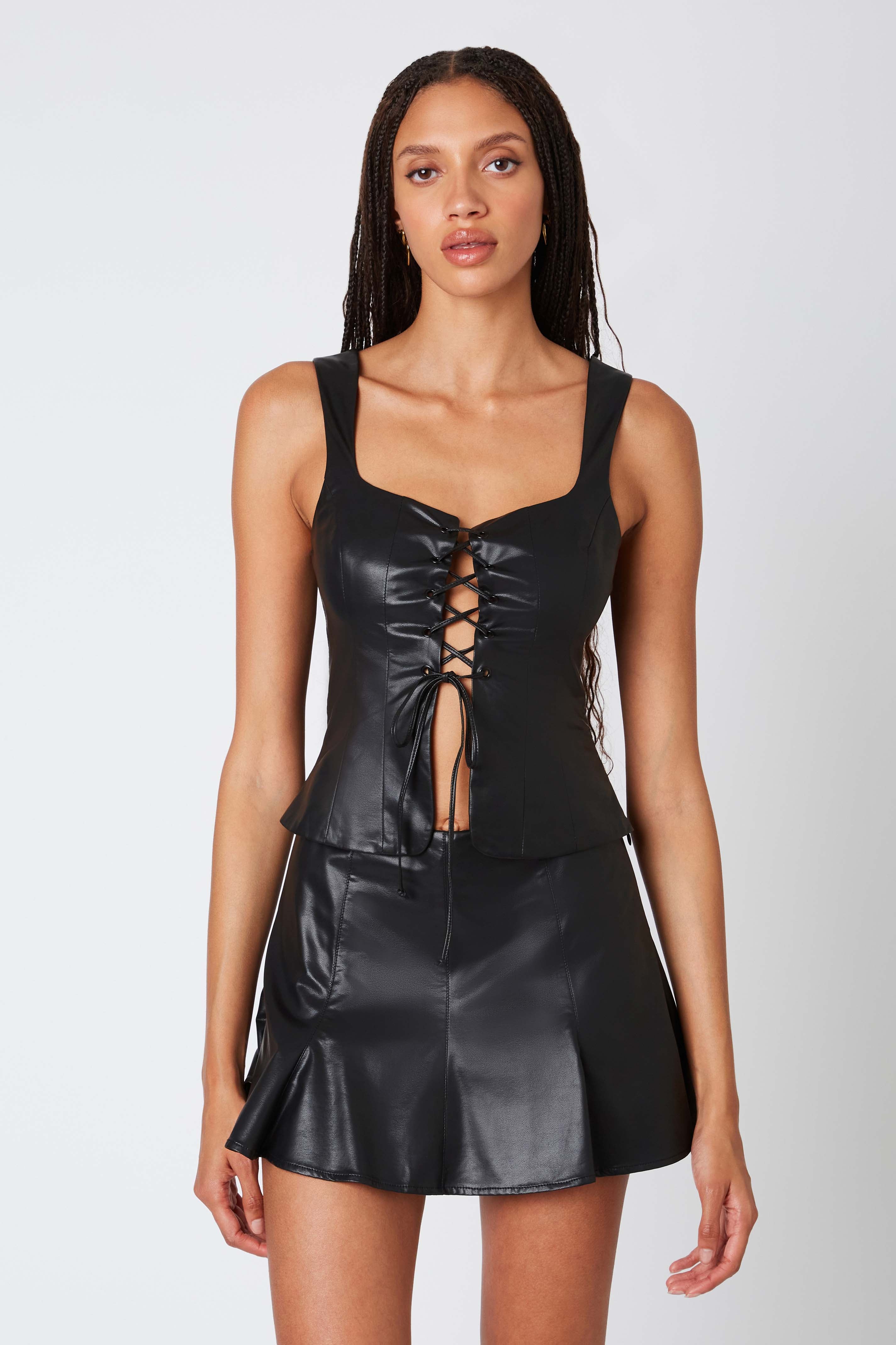 Faux Leather Pleated Mini Skort in Black Front View