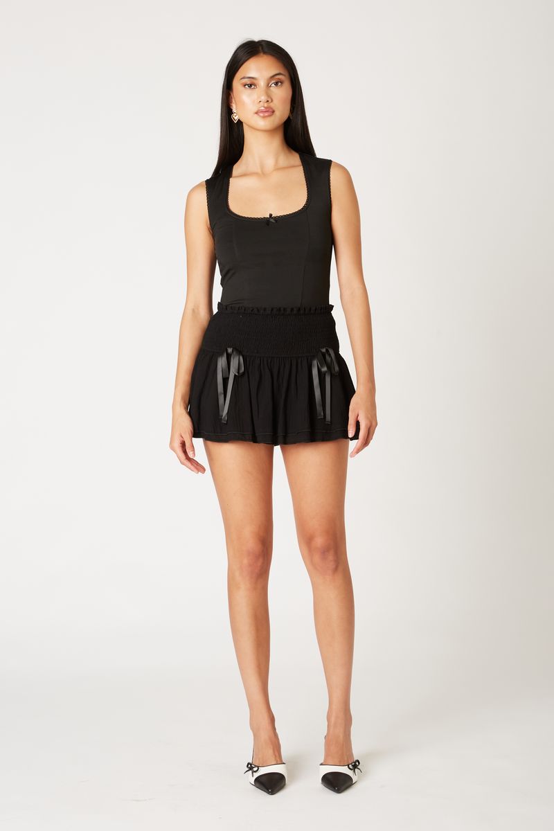 Smocked Coquette Mini Skirt in black front view