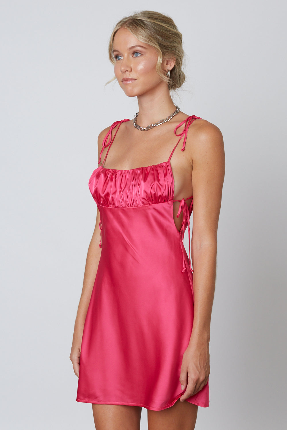 SATIN MINI DRESS IN PINK SIDE VIEW