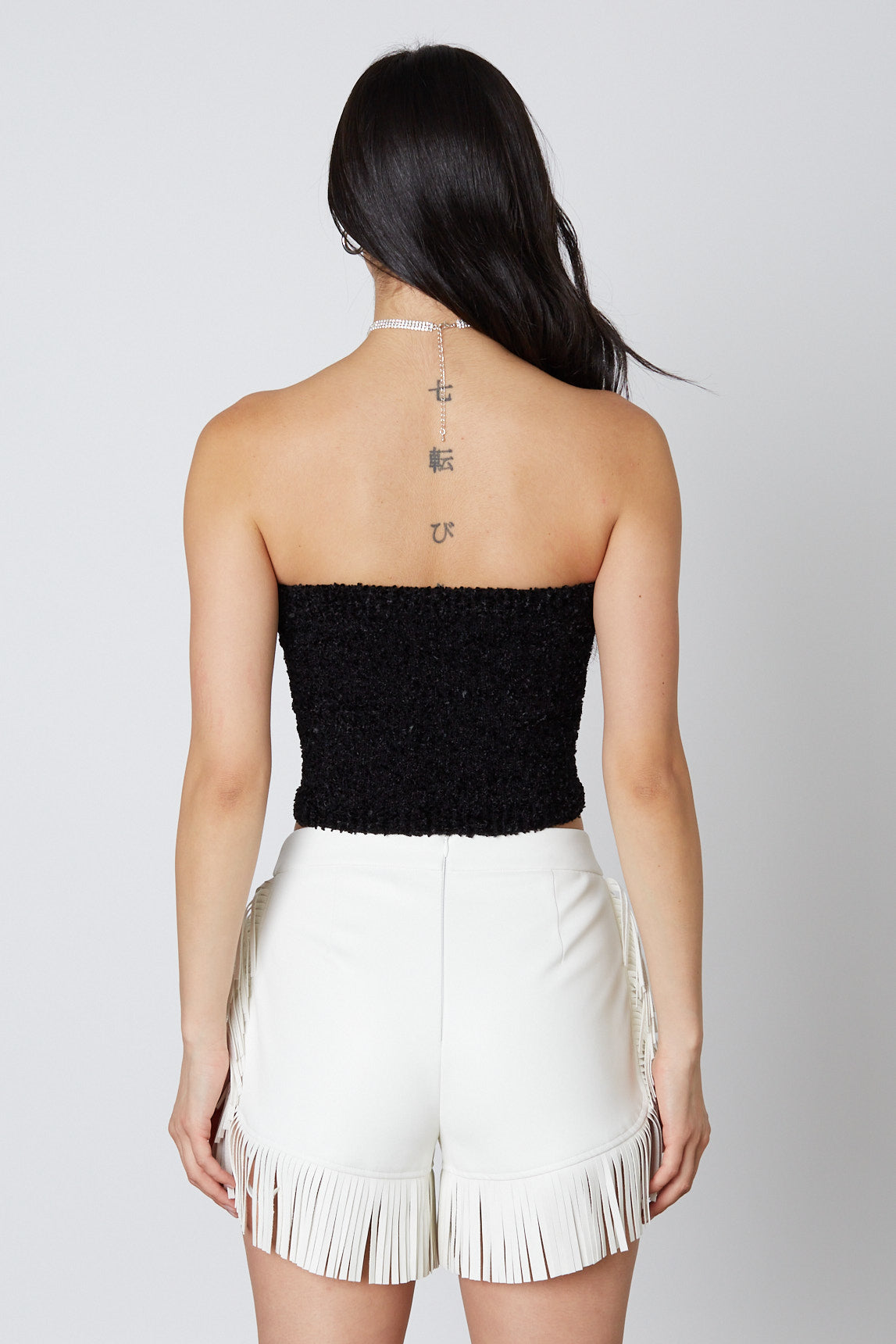 Faux Leather Fringe Shorts in White Back