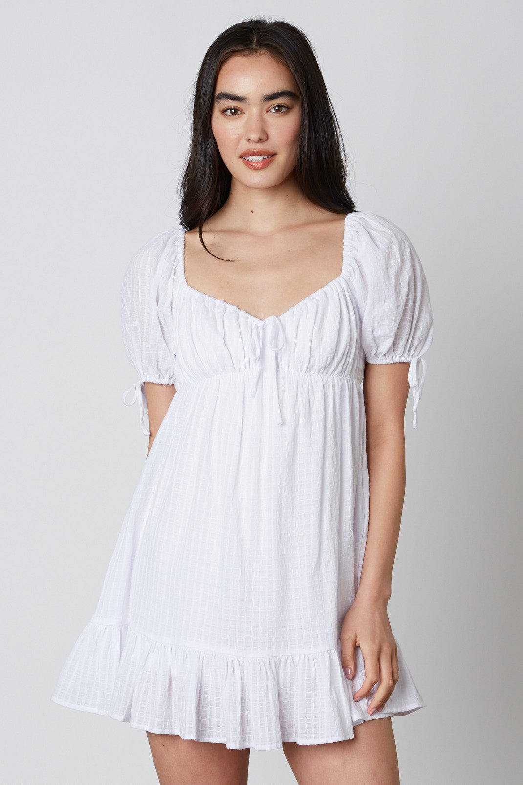 Puff Sleeve Babydoll Romper in White Front